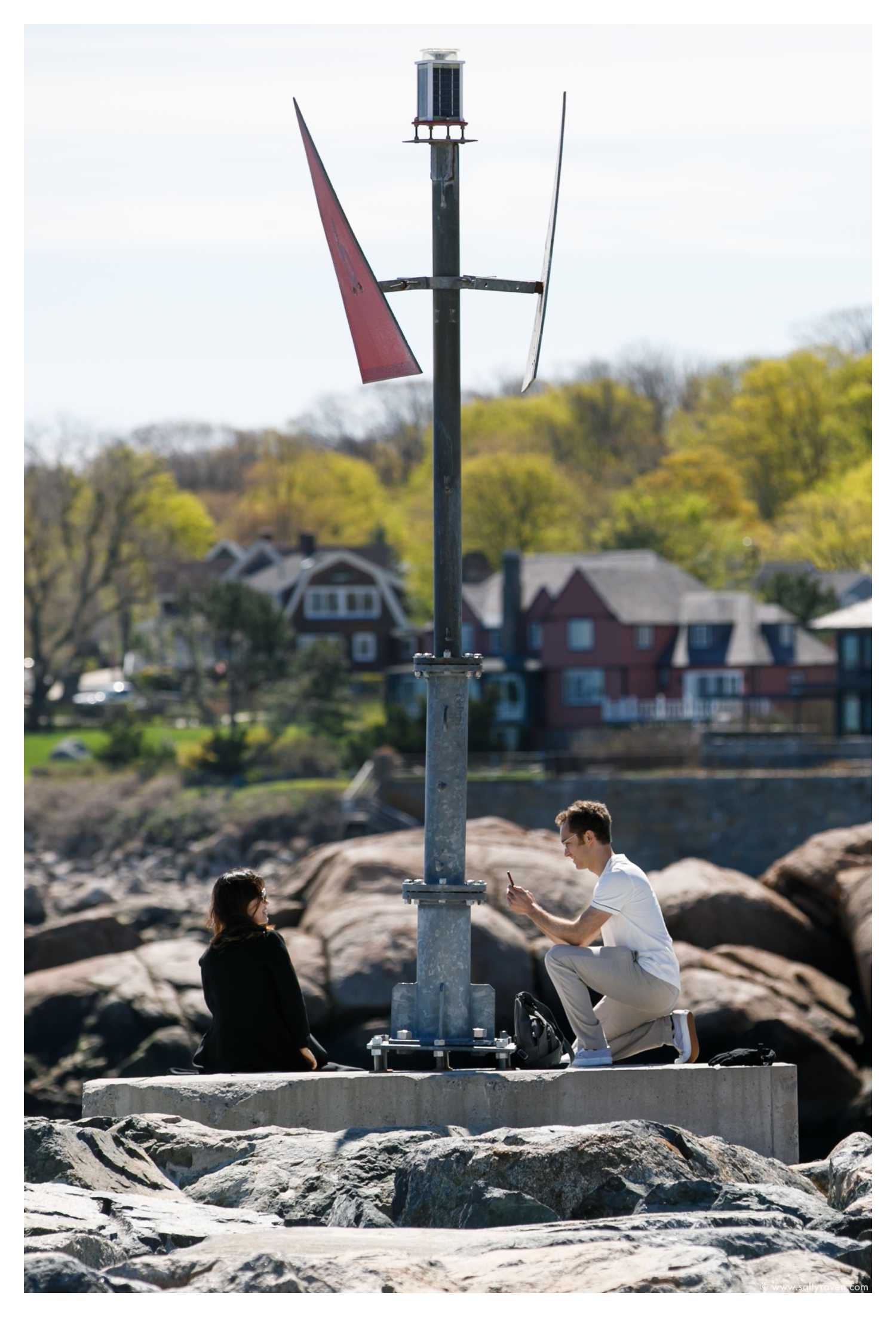 They reached the end, and he took a photo of her with his cell phone before proposing.