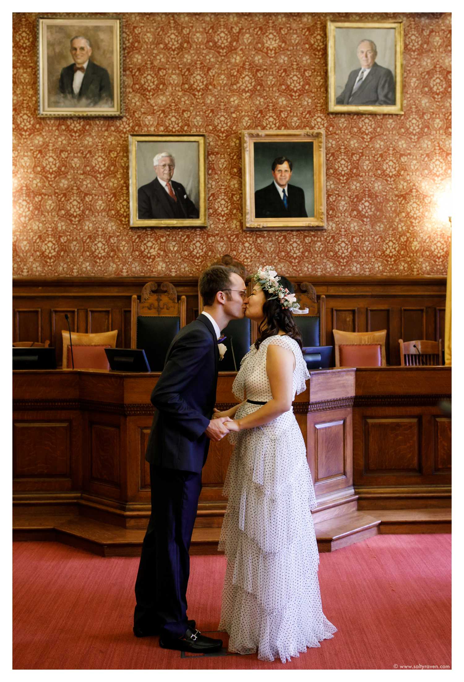 The first kiss as a newly married couple in Cambridge, MA